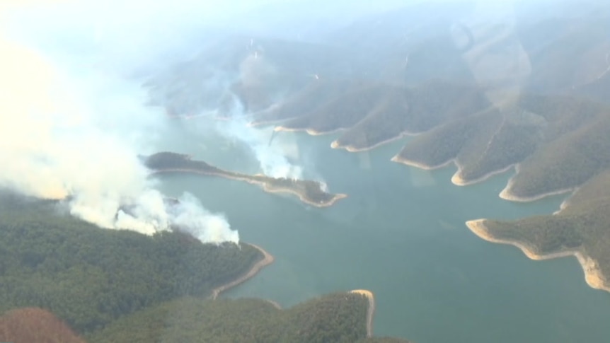 Smoke billows from fires burning at the Thomson Catchment Complex