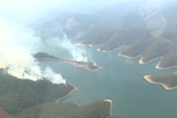Smoke billows from fires burning at the Thomson Catchment Complex