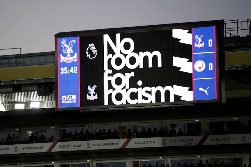 An anti-racism message is displayed on the big screen at the ground during a Premier League match.