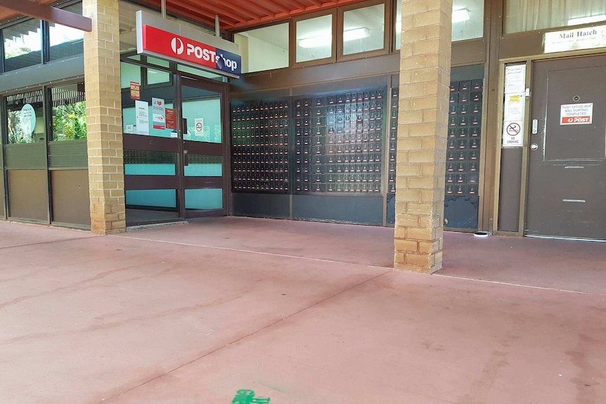 Greens logo sprayed on the ground outside a post office in Karratha