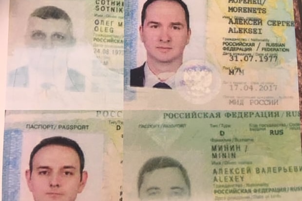 Four passports lying side by side