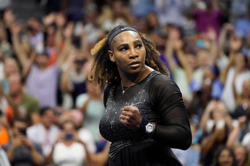 Serena Williams pumps her fist and looks at the crowd after she wins another match at the US Open.