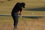 Rory McIlroy hits a shot at Muirfield