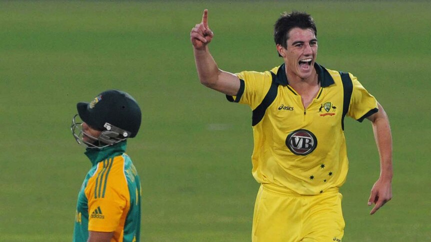 Pat Cummins celebrates ODI wicket with JP Duminy in the foreground
