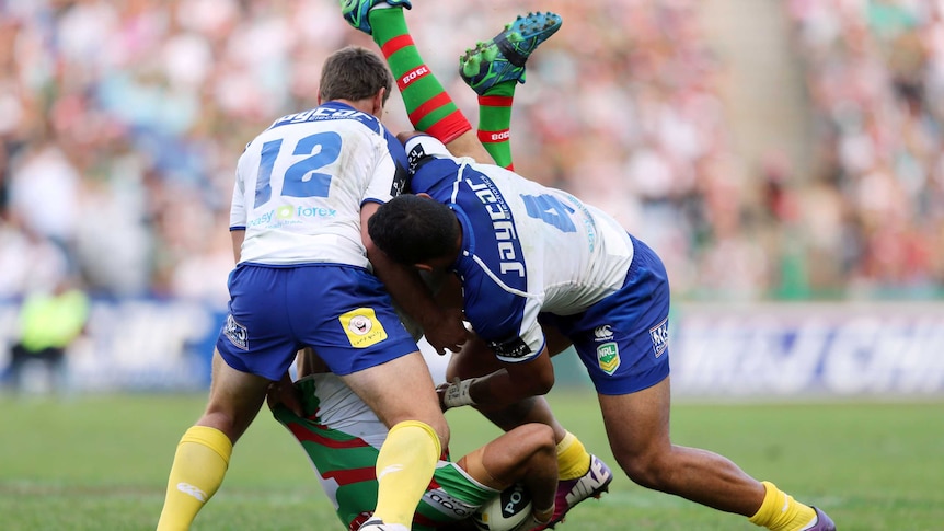 Ugly incident ... Greg Inglis is spear tackled by Krisnan Inu (R)
