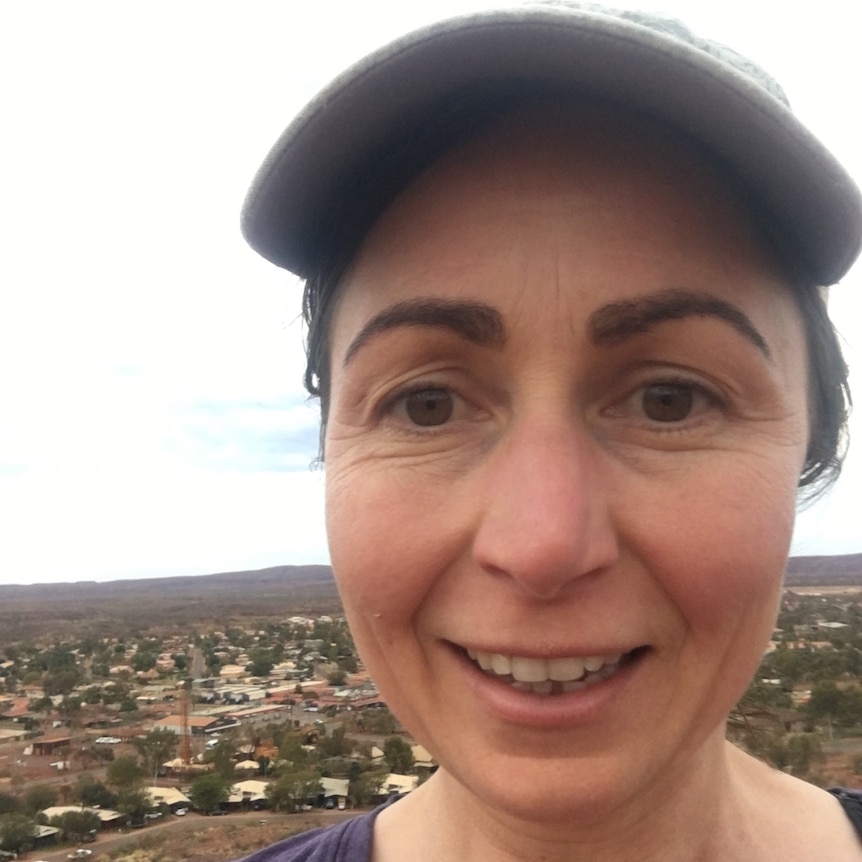 close up of woman with brown eyes in an outback location.
