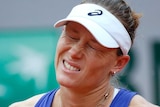 Stosur grimaces against Sharapova