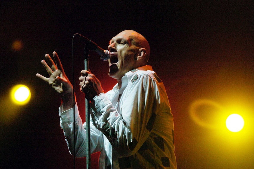 Peter Garrett performing with Midnight Oil.