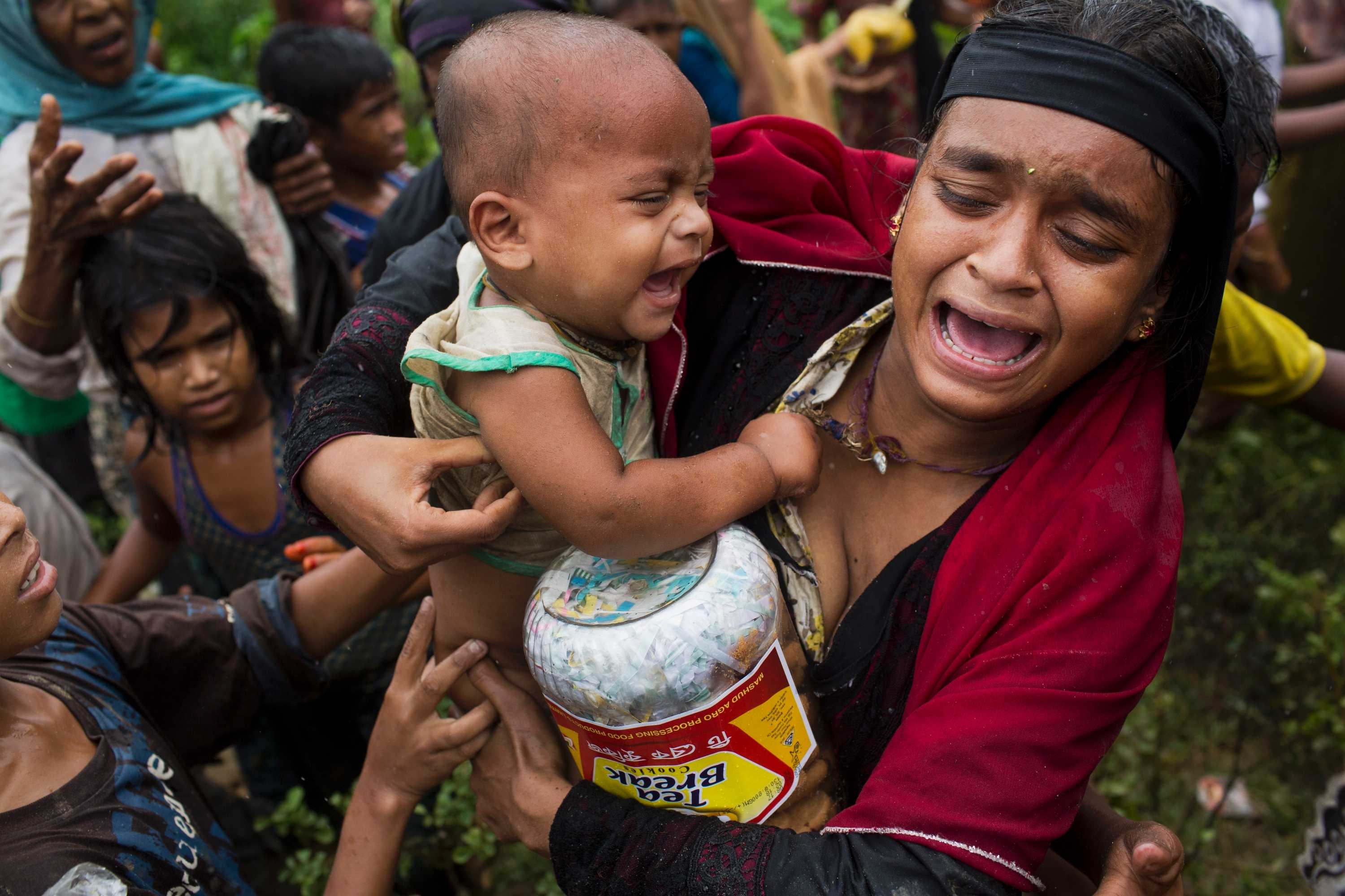 Rohingya Muslims Fleeing Violence In Myanmar Fight For Survival In ...