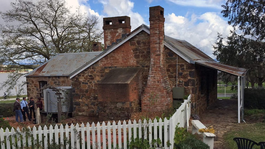 The historic Blundell's Cottage on the shores of Canberra's Lake Burley Griffin.