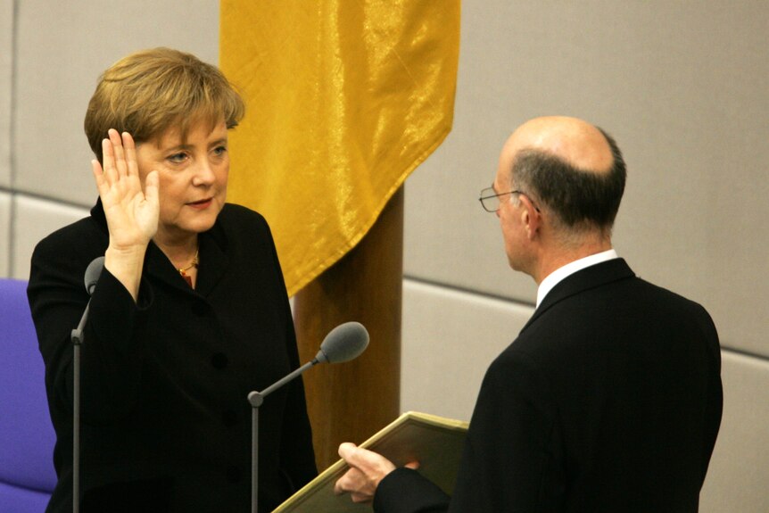 Angela Merkel is sworn in as Chancellor in 2005.
