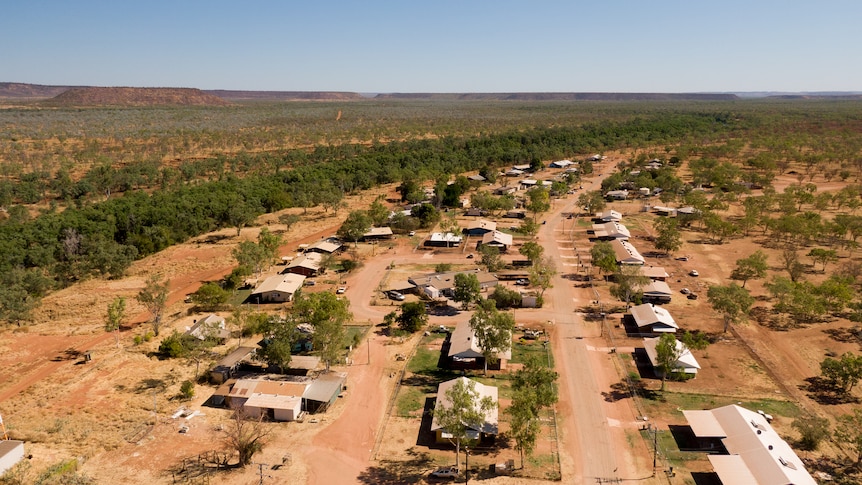 A drone photo of rows of houses in a remote community in the Northern Territory