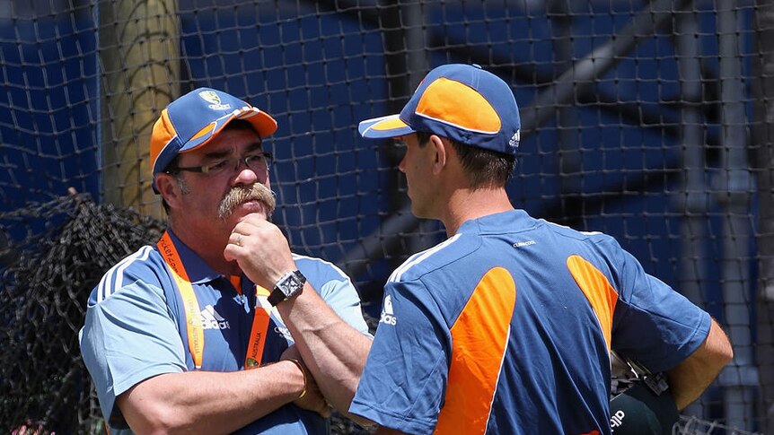 Decisions, decisions: Ricky Ponting chats with selector David Boon at a nets session.