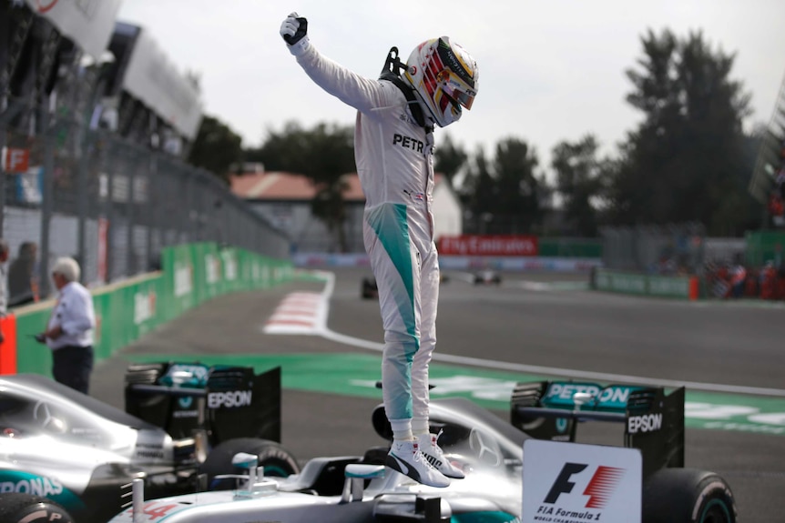 Lewis Hamilton celebrates in Mexico