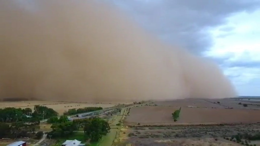 A dust storm sweeps across Kerang in northern Victoria