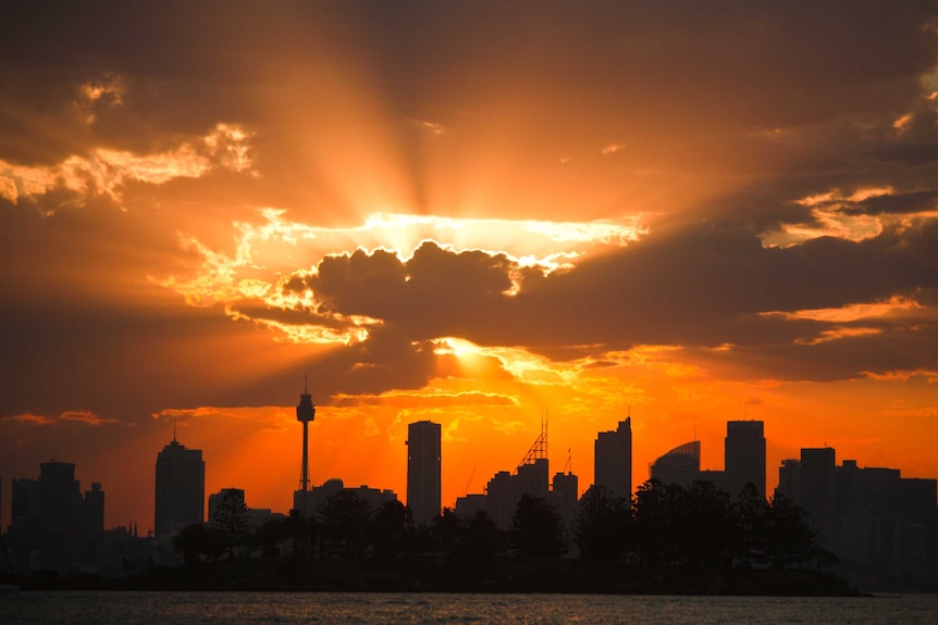 Orange clouds over the Sydney skyline.