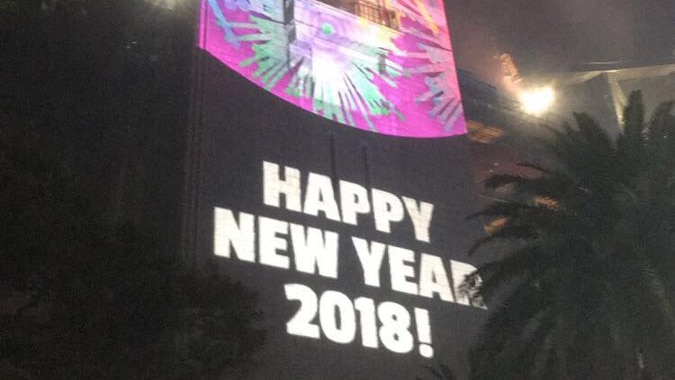 coloured pylon that says "happy new year 2018!"