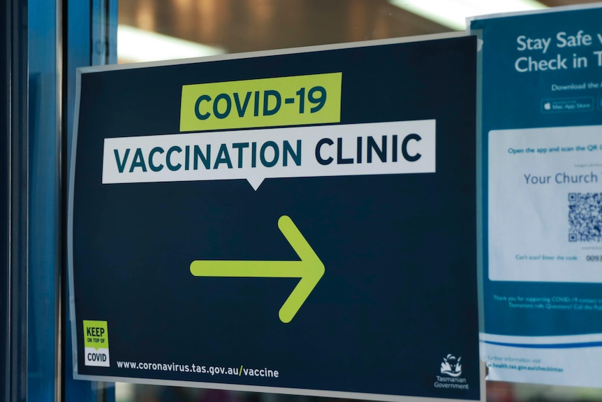 Sign at COVID-19 vaccination clinic.