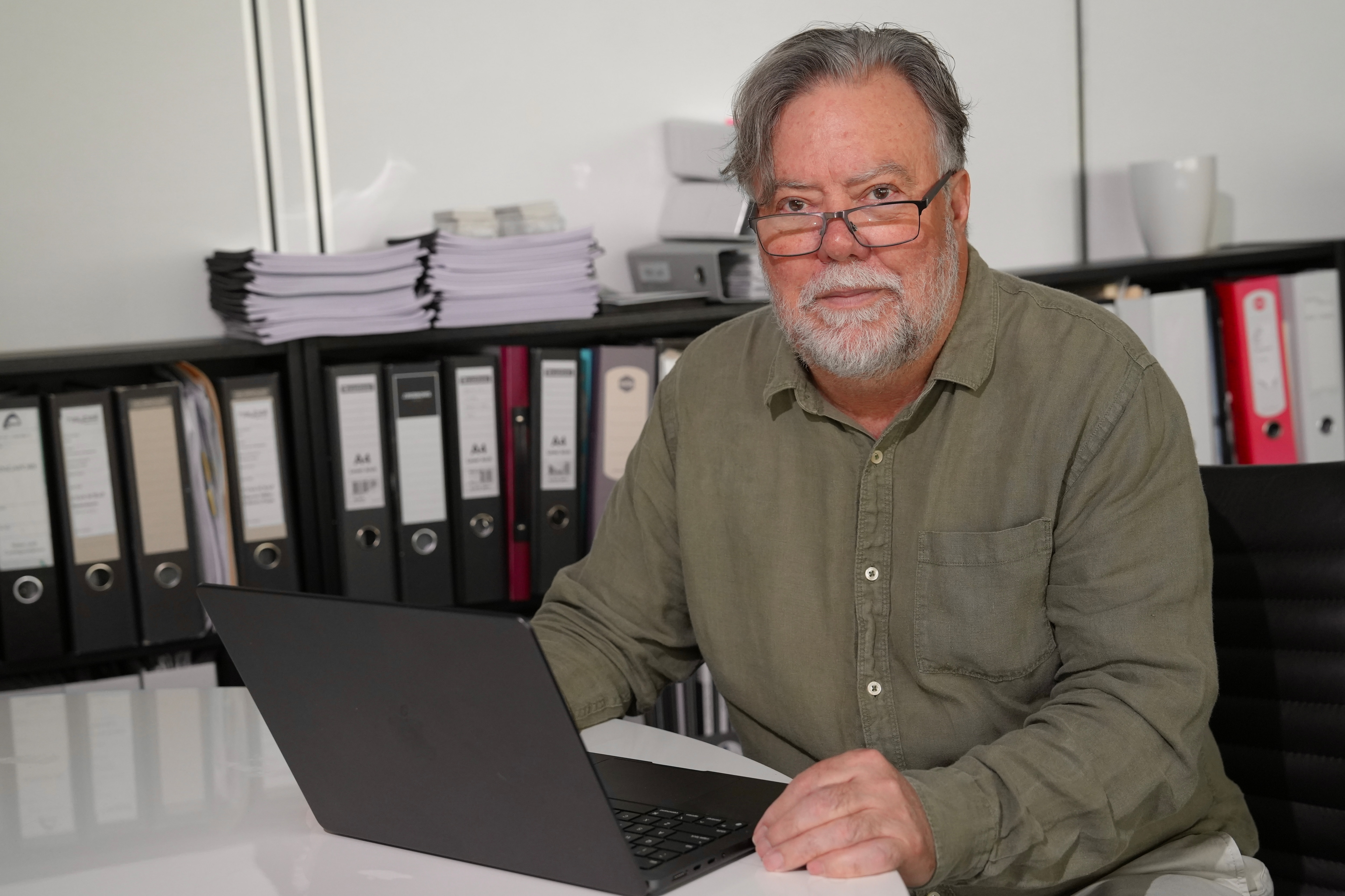 a man in a green shirt