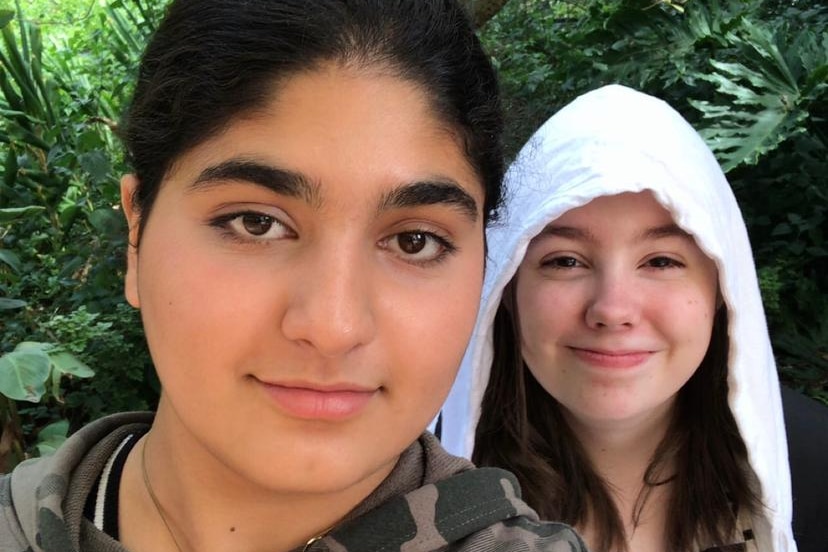 Two teenage girls in a selfie. 