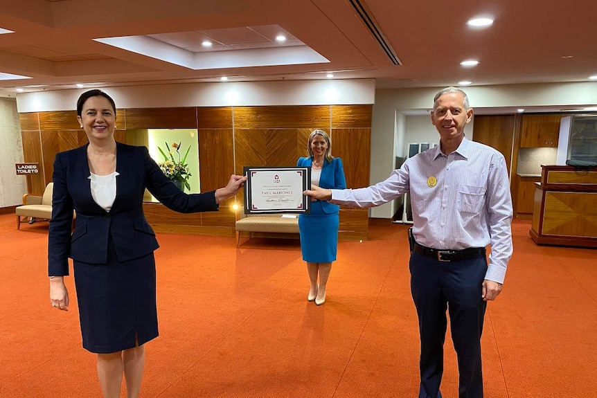 Paul Mahoney from the Care Army with Premier Annastacia Palaszczuk.