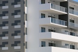 A close up of balconies on an apartment building.