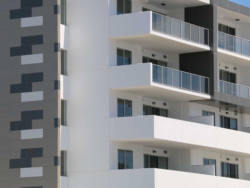 A close up of balconies on an apartment building.