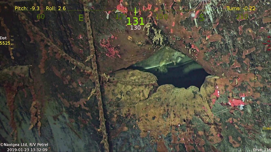 Damage on the hull of the USS Hornet.