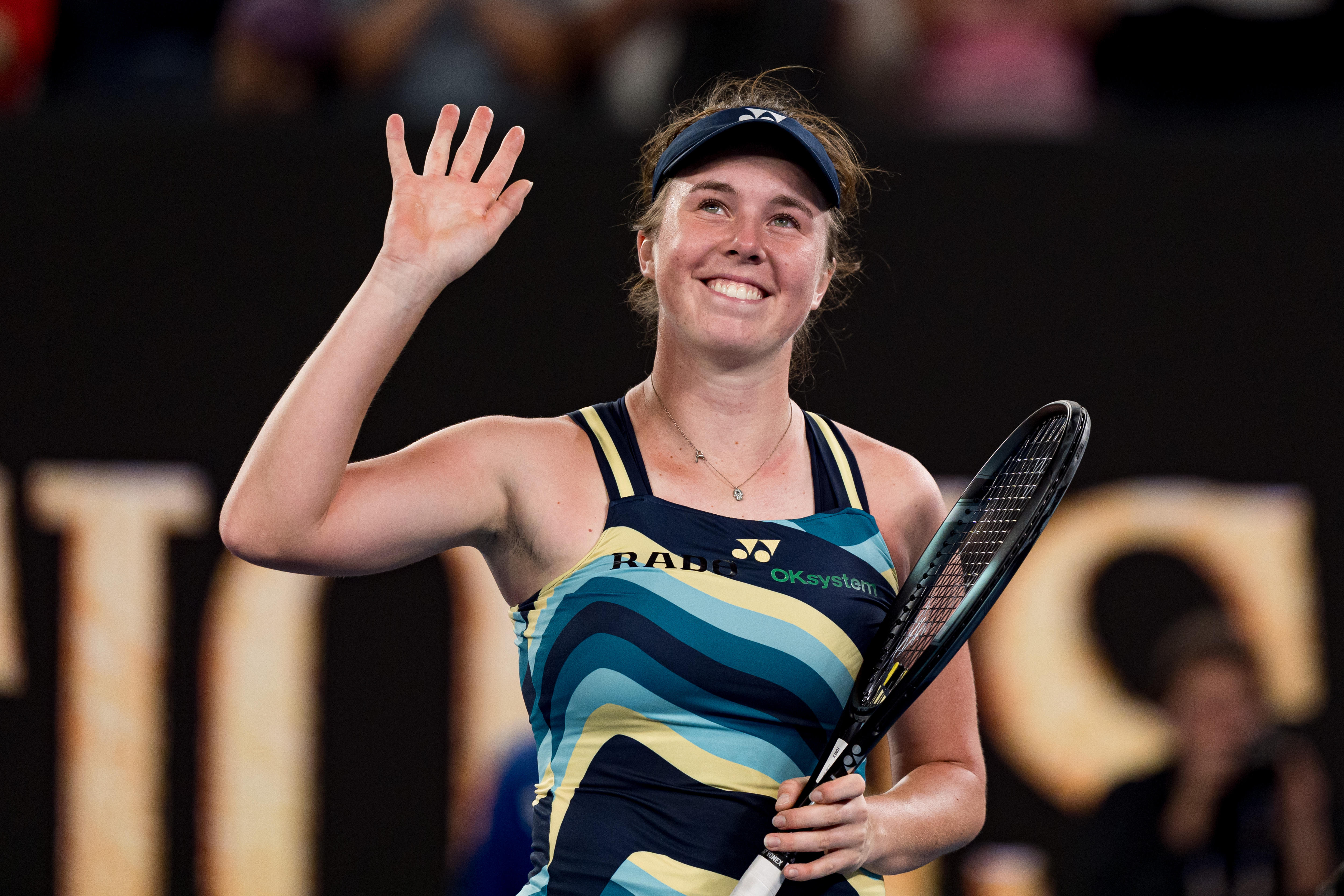 Linda Nosková waves to the Rod Laver Arena crowd at the 2024 Australian Open.