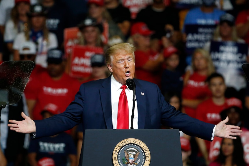 Trump gestures at the Tulsa rally