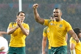 Wallabies celebrate their Rugby World Cup quarter-final win over Scotland