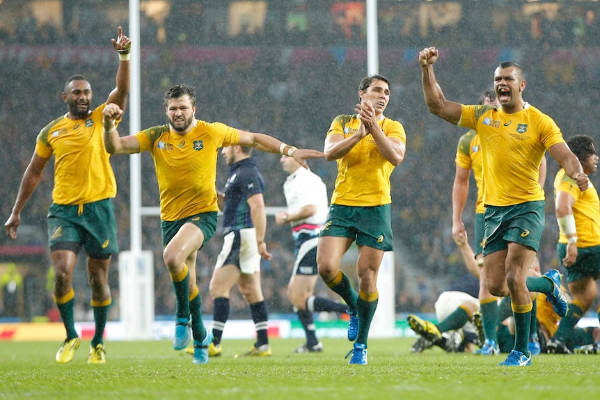 Wallabies celebrate their Rugby World Cup quarter-final win over Scotland