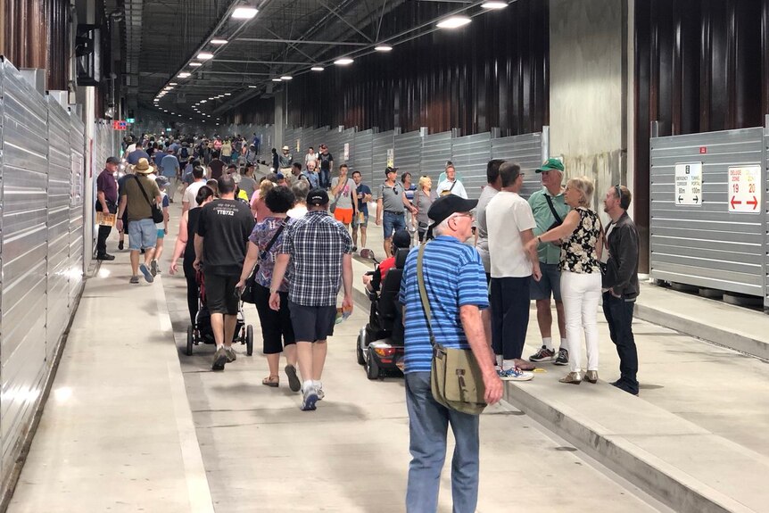 Members of the public inside the new O-Bahn tunnel.