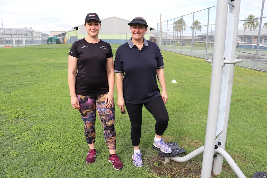 QCS Assistant Commissioner for Women and Safer Custody Tamara Bambrick and Parkrun ambassador Kristen McGuire smile at the camer