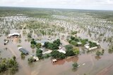 An aerial view of a flooded outback roadhouse.