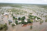 An aerial view of a flooded outback roadhouse.