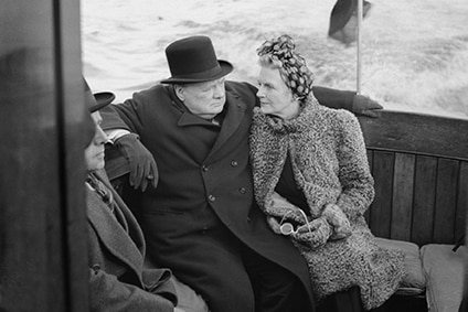 Winston Churchill and his wife, Clementine, sit on board a naval patrol vessel in east London in 1940.