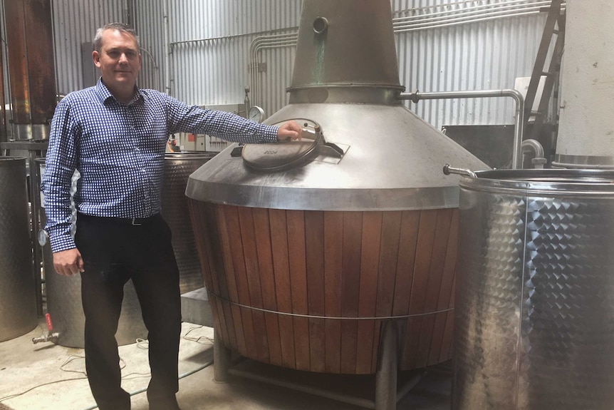 Cameron Syme at his whiskey distillery in Albany