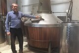 Cameron Syme at his whiskey distillery in Albany