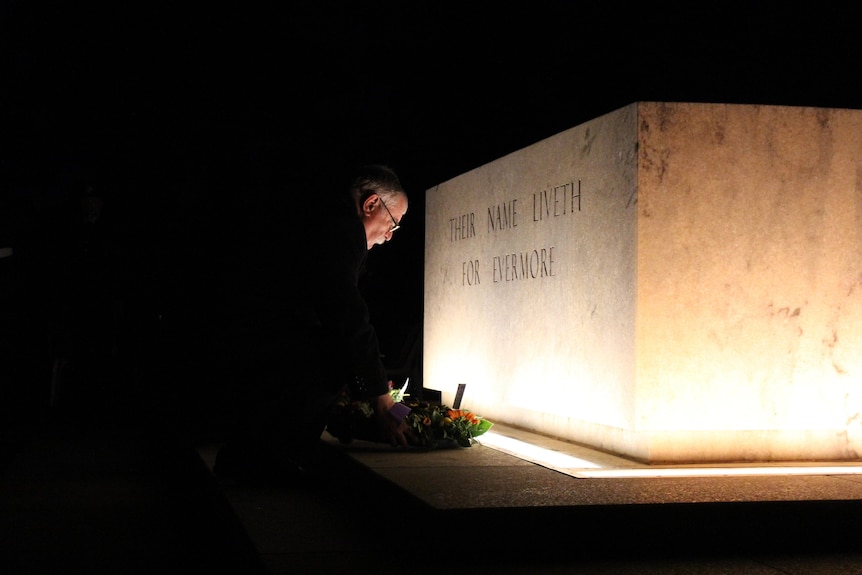 John King from ACT RSL lays a wreath at the National War Memorial.