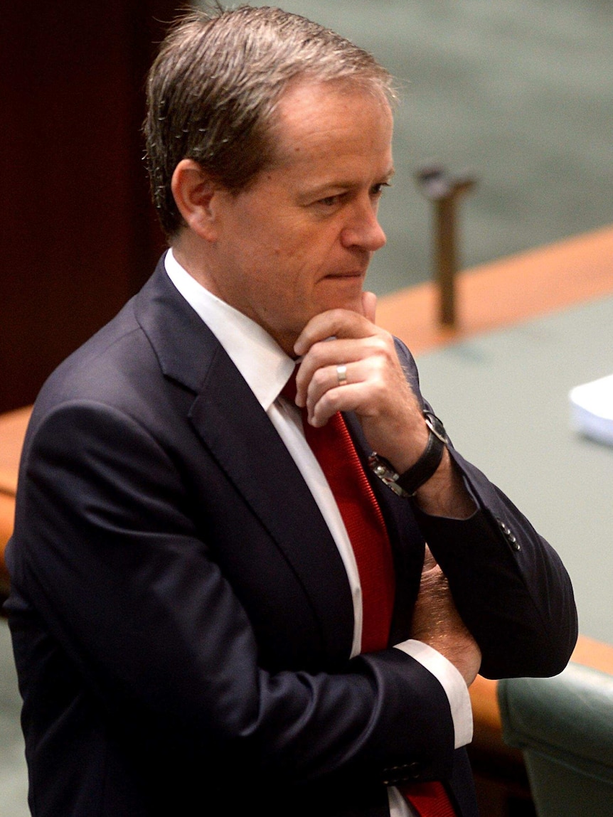 Opposition Leader Bill Shorten stands in the House of Representatives chamber at Parliament House.