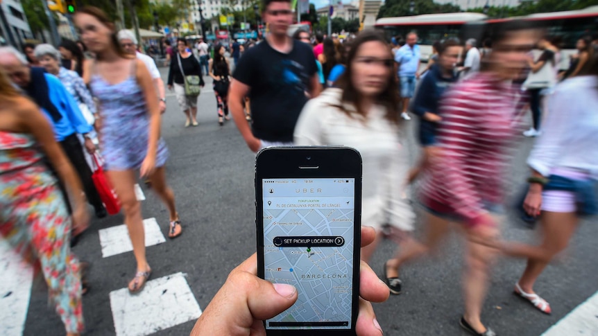 An Uber user selects a pick-up location in Barcelona, Spain.