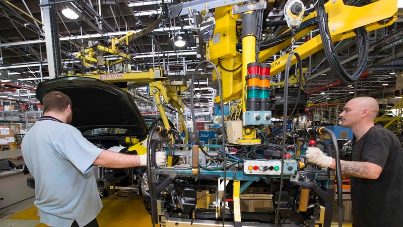 Holden workers on the assembly line for the VF Commodore at Elizabeth in South Australia.