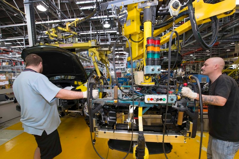 Holden workers on the assembly line for the VF Commodore at Elizabeth in South Australia.