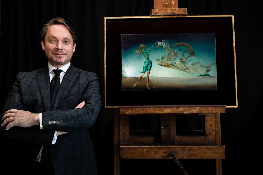 National Gallery of Victoria director Tony Ellwood with Salvador Dali's Trilogy of the Desert.