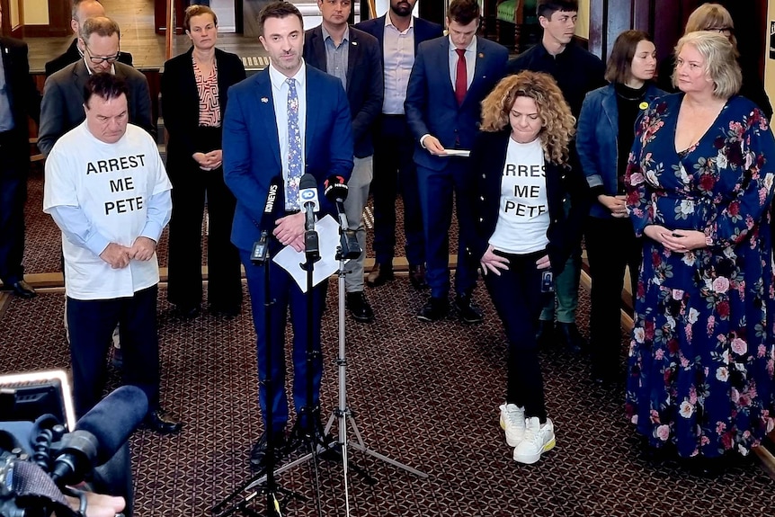 A group of South Australian MPs at a media conference.