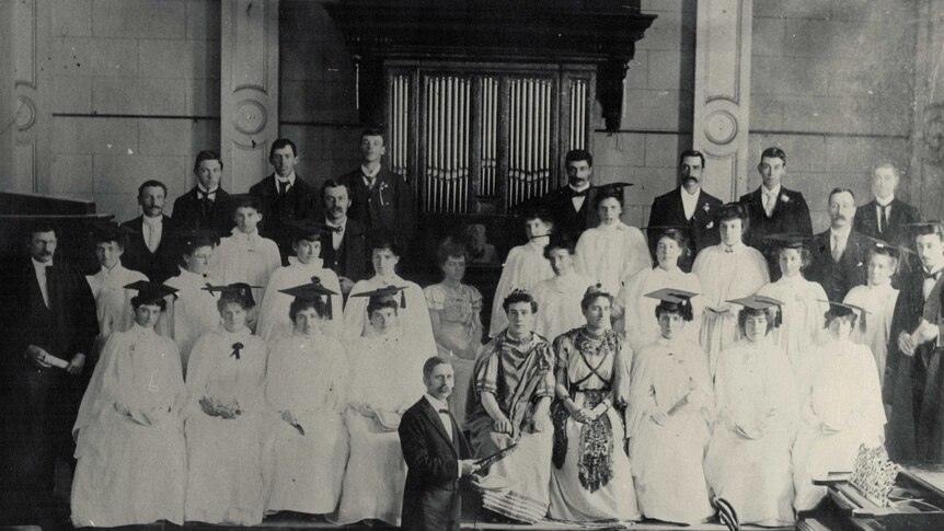 Beechworth locals stand in front of the town hall organ (circa 1886)