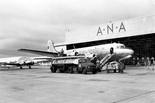 1955 ANA aircraft ourside hanger on tarmac at Perth airport