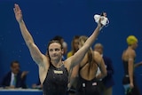 Katinka Hosszu celebrates winning the 100m backstroke final