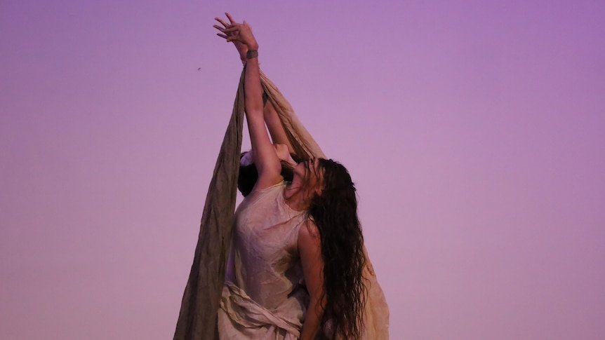 Aboriginal woman performs at the opening of Purrumpa festival